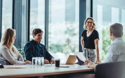Person Standing at a Meeting